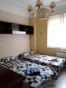 A bed or beds in a room at Marqu&eacute;s de La Rioja 