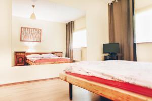 Posteľ alebo postele v izbe v ubytovaní Motel Hotelik