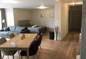 Posezení v ubytování L'Aparté