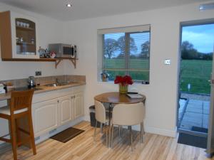A kitchen or kitchenette at The Stables - Deer Park Farm