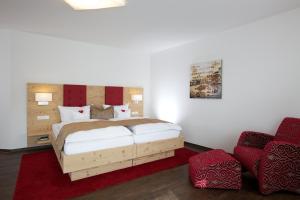 Postel nebo postele na pokoji v ubytování Naturparkhotel Adler