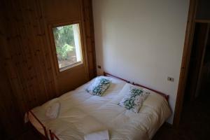 Llit o llits en una habitació de Appartamento EIRA