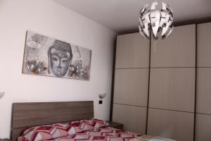 Postel nebo postele na pokoji v ubytování Porta del Carmine