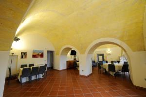 מסעדה או מקום אחר לאכול בו ב-Masseria La Meridiana