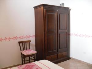 A bed or beds in a room at Nonna Murtas