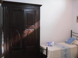 A bed or beds in a room at Nonna Murtas