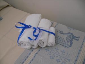 A bed or beds in a room at Nonna Murtas