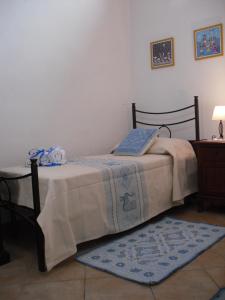 Кровать или кровати в номере Nonna Murtas