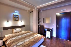 Voodi või voodid majutusasutuse Guesthouse Vitez toas