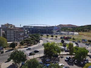 a view of a parking lot with a stadium at B&B I Tre Sensi in Crotone