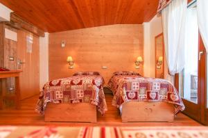 Postel nebo postele na pokoji v ubytování Albergo Adele