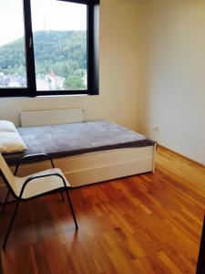 Postel nebo postele na pokoji v ubytování Triplex Residence, Lux-appartment in the central part