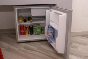 an open refrigerator with food and drinks in it at Il Diamante in Crotone