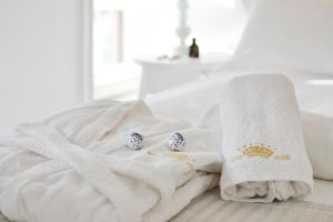 Кровать или кровати в номере Casa Regina Luxury House