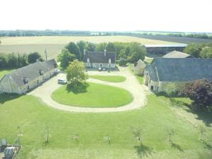 Vaade majutusasutusele Gite et chambre d'hôtes Du Guillot linnulennult