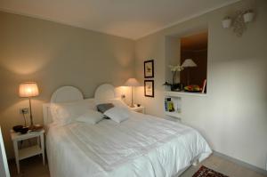 A bed or beds in a room at BeB Casa Bettini