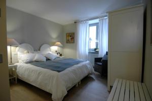 A bed or beds in a room at BeB Casa Bettini