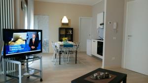 TV a/nebo společenská místnost v ubytování Casa Domenica