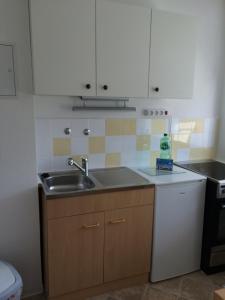 Køkken eller tekøkken på Ferienwohnung "Krabbe" + 5 billeder