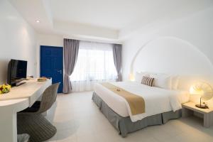 Postel nebo postele na pokoji v ubytování Ocean Breeze Resort Khaolak