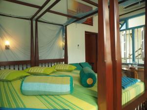 Letto o letti in una camera di Main Reef Guest House
