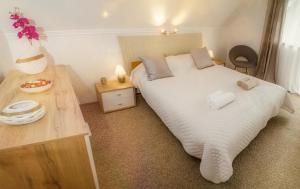 Fotografie z fotogalerie ubytování Erika Apartmanház v destinaci Dombóvár