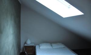 Letto o letti in una camera di Gîte Ferme d'Ortie