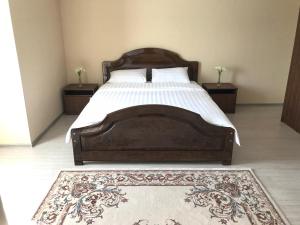 Rúm í herbergi á Nomad Hotel