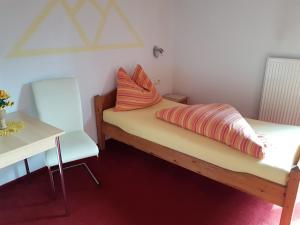 Postelja oz. postelje v sobi nastanitve Landgasthof Astner