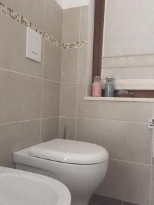 Vannituba majutusasutuses Su Corittu Guesthouse