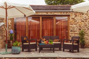 Patio lub wspólna przestrzeń na świeżym powietrzu w obiekcie Os Tres Teixos