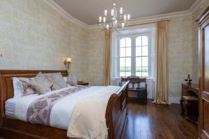 מיטה או מיטות בחדר ב-Wilton Castle