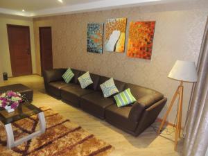 Posezení v ubytování Dela Chambre Hotel