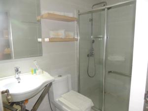 Koupelna v ubytování Dela Chambre Hotel