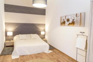 Voodi või voodid majutusasutuse Luxury 2BR Apt by the Synagogue toas