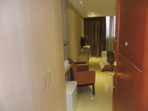 Posezení v ubytování Dela Chambre Hotel