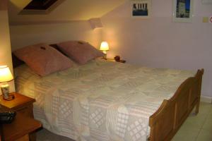 Ein Bett oder Betten in einem Zimmer der Unterkunft Le Castillon