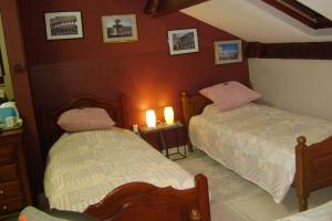 Ein Bett oder Betten in einem Zimmer der Unterkunft Le Castillon