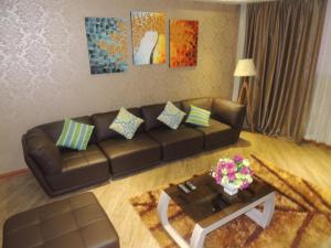 Posezení v ubytování Dela Chambre Hotel