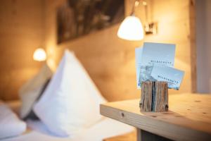 Posteľ alebo postele v izbe v ubytovaní Hotel Wildschütz