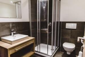 A bathroom at A Casa Juwel Apartment