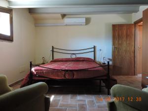 Letto o letti in una camera di Casa Cardarella