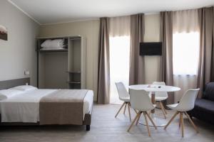 Posteľ alebo postele v izbe v ubytovaní Hotel & Wellness Stella Delle Langhe