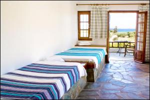 Postel nebo postele na pokoji v ubytování Casa di Mare