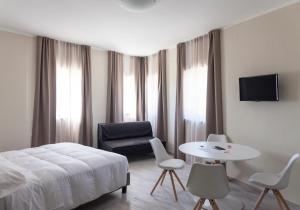 Posteľ alebo postele v izbe v ubytovaní Hotel & Wellness Stella Delle Langhe + 37 fotografií