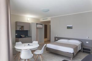 Posteľ alebo postele v izbe v ubytovaní Hotel & Wellness Stella Delle Langhe