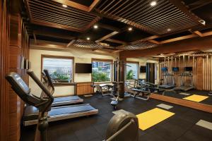 a gym with treadmills and ellipticals in a room at Ginger Goa, Panjim in Panaji