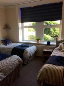 Lismore Guest House客房内的一张或多张床位