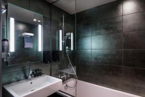 Koupelna v ubytování Home Hotel Folketeateret