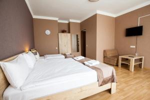 Katil atau katil-katil dalam bilik di Hotel Almi